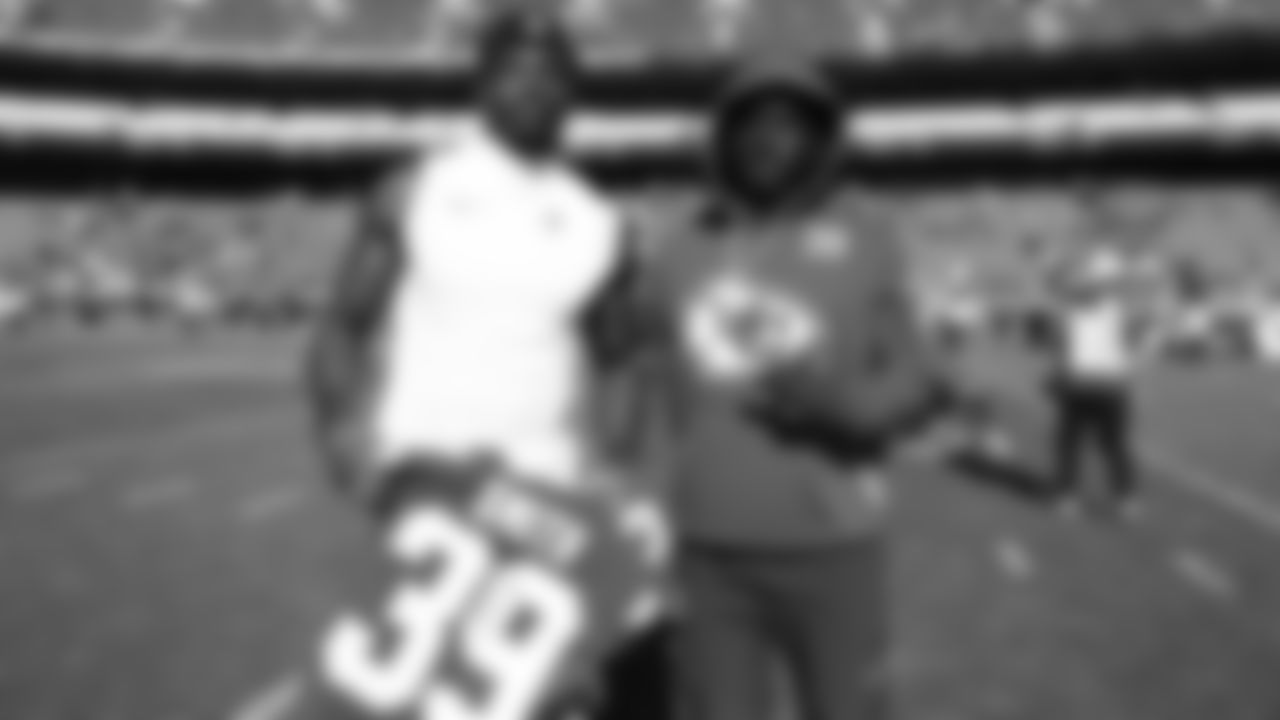Kansas City Chiefs cornerback Melvin Smith (39) poses with a Las Vegas Raiders player after a week 7 NFL Football game against the Las Vegas Raiders on Sunday, October 19, 2025 in Kansas City, MO.