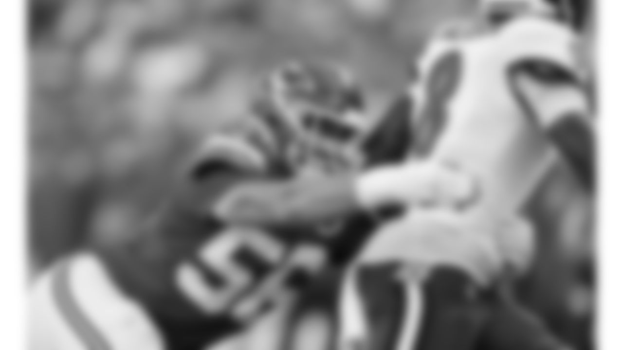 Kansas City Chiefs defensive end George Karlaftis (56) hits Baltimore Ravens quarterback Lamar Jackson (8) during the week 4 NFL football game, Sunday, September 28, 2025 in Kansas City, MO.