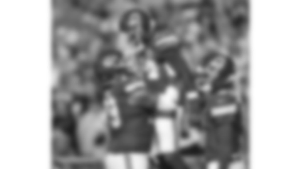 Kansas City Chiefs offensive lineman Esa Pole (79) lifts running back Brashard Smith (24) in the end zone during a week 17 NFL football game against the Denver Broncos, Thursday, December 25, 2025 in Kansas City, MO.