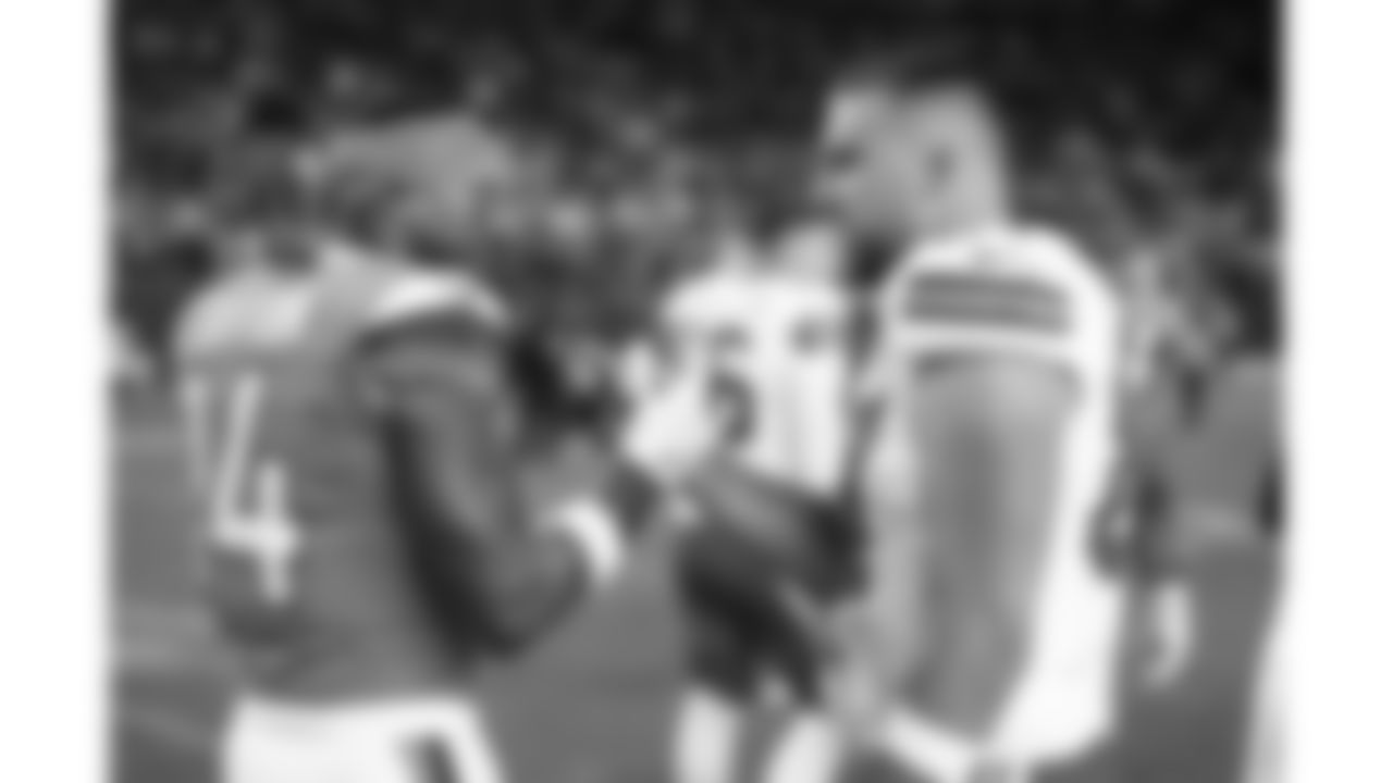 Kansas City Chiefs tight end Travis Kelce (87) and Broncos wide receiver Courtland Sutton (14) after a week 11 NFL Football game against the Denver Broncos on Sunday, November 16, 2025 in Denver, Colorado.