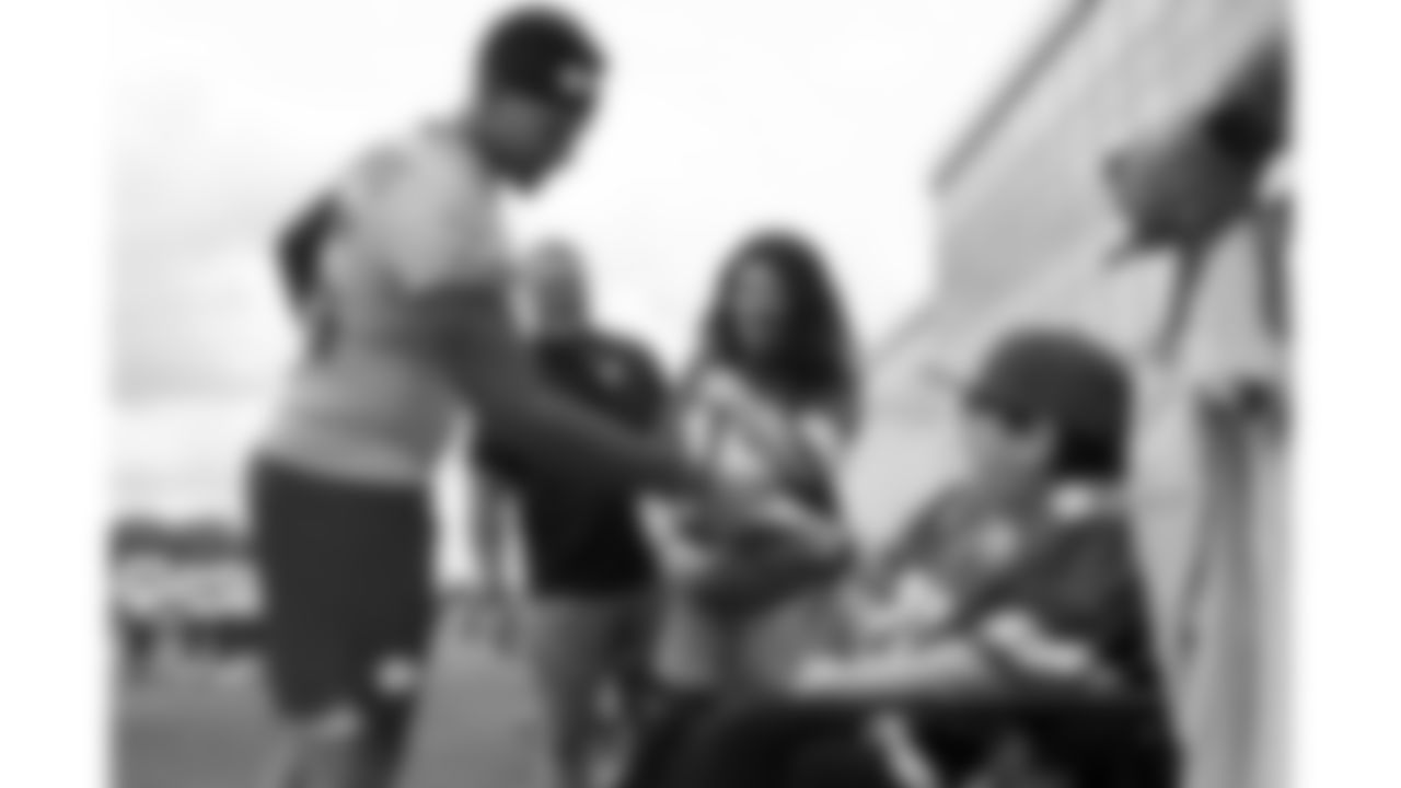 Josh "Turbo" Pham, a child battling an aggressive disease, visits practice during phase 3 of OTAs on Friday, June 13, 2025 in Kansas City, MO.