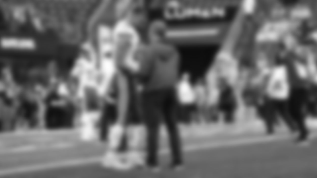 Kansas City Chiefs tight end Travis Kelce (87) talks to Defensive Coordinator Steve Spagnuolo prior to a preseason week 2 NFL football game against the Seattle Seahawks, Friday, August 15, 2025 in Seattle, WA.