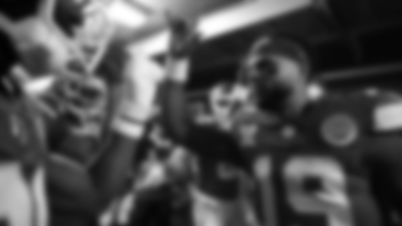 Kansas City Chiefs quarterback Chris Oladokun (19) talks with the team in the fifty yard line tunnel prior to an NFL week 17 matchup against the Denver Broncos, Thursday, December 25, 2025.