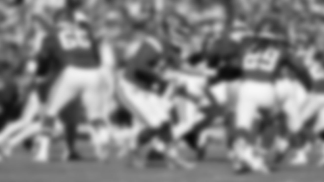 Quarterback Patrick Mahomes (15) hands off the ball to Kansas City Chiefs running back Kareem Hunt (29) during a week 12 NFL Football game against the Indianapolis Colts on Sunday, November 23, 2025 in Kansas City, MO