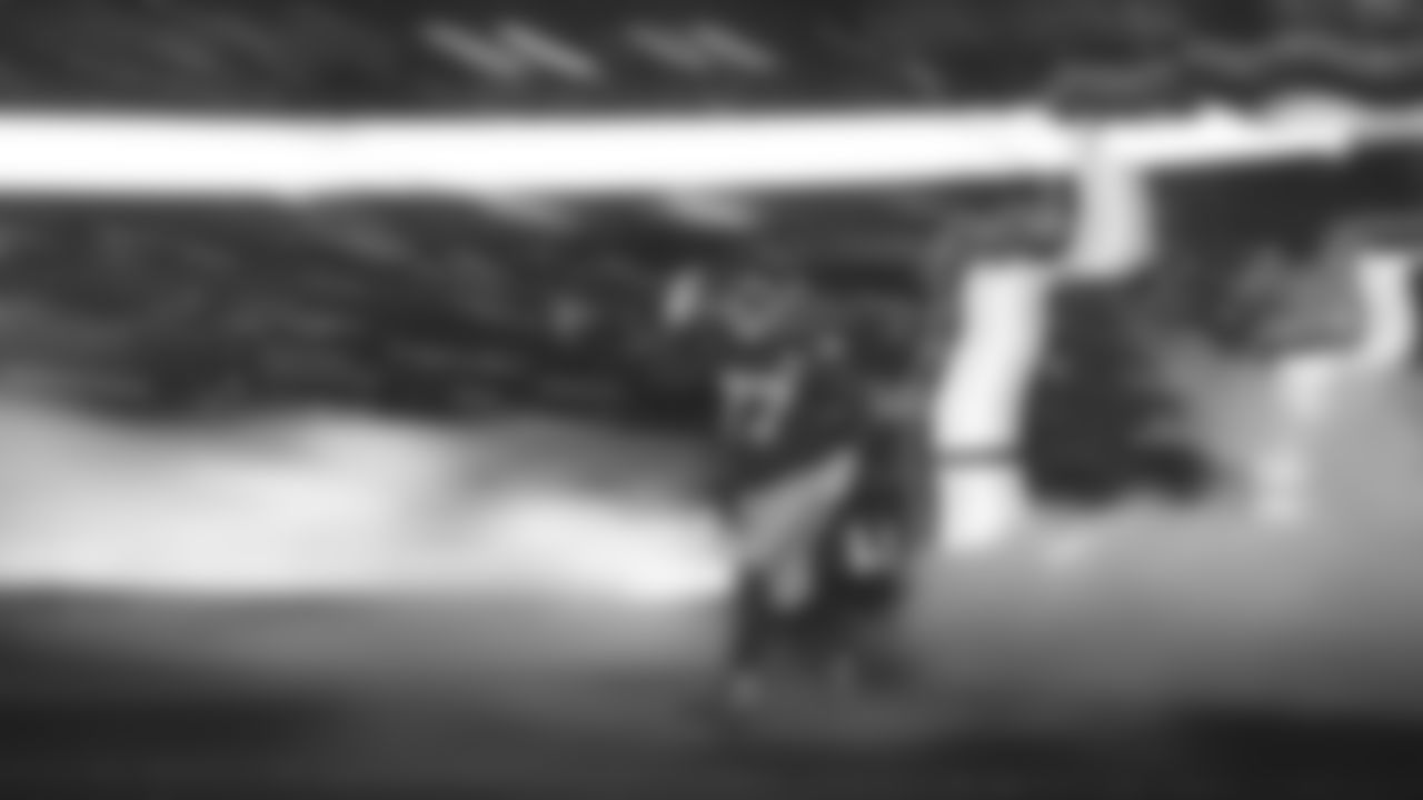 Kansas City Chiefs offensive lineman Jaylon Moore (77) runs onto field prior to an NFL week 14 matchup against the Houston Texans, Sunday December 7, 2025.