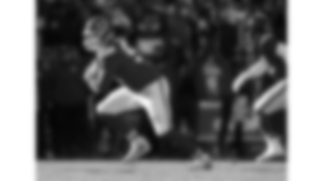 Kansas City Chiefs defensive end Ashton Gillotte (97) intercepts the ball during a week 15 NFL football game against the Los Angeles Chargers, Sunday, December 14, 2025 in Kansas City, MO.