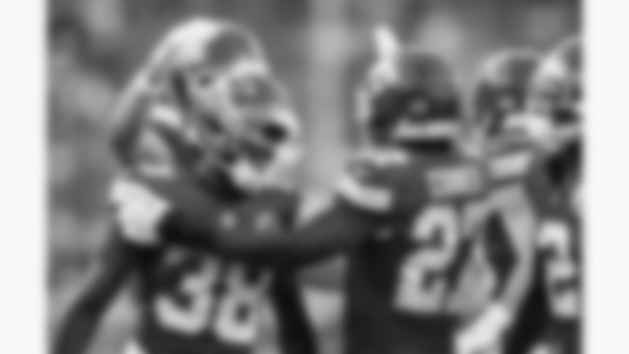 Kansas City Chiefs defensive back Kevin Knowles (38) and defensive back Chamarri Conner (27) celebrate together during the week 4 NFL football game against the Baltimore Ravens, Sunday, September 28, 2025 in Kansas City, MO.