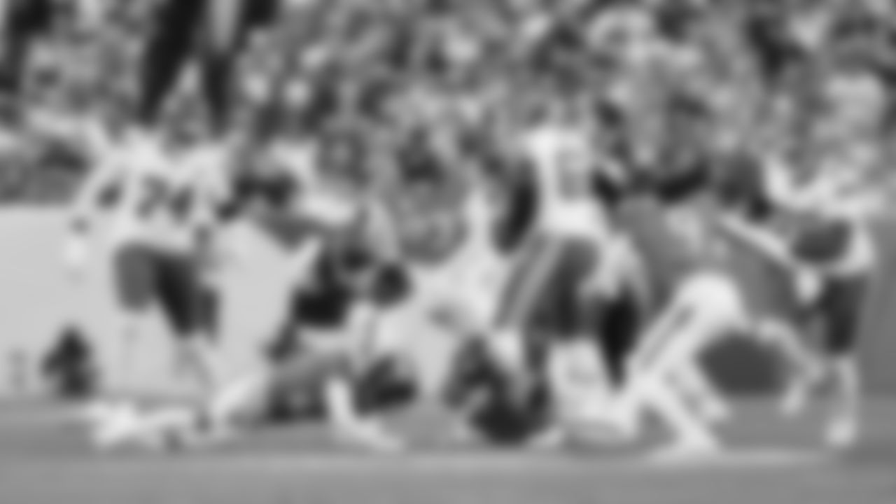 Kansas City Chiefs running back Kareem Hunt (29) leaps with the ball during a week 11 NFL Football game against the Denver Broncos on Sunday, November 16, 2025 in Denver, Colorado.