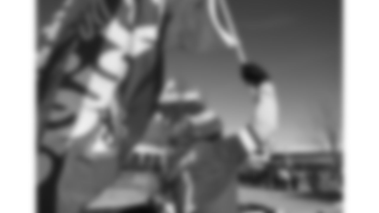 Chiefs Flag Runners prior to a week 15 NFL Football game against the Los Angeles Chargers on Sunday, December 14, 2025 in Kansas City, MO.