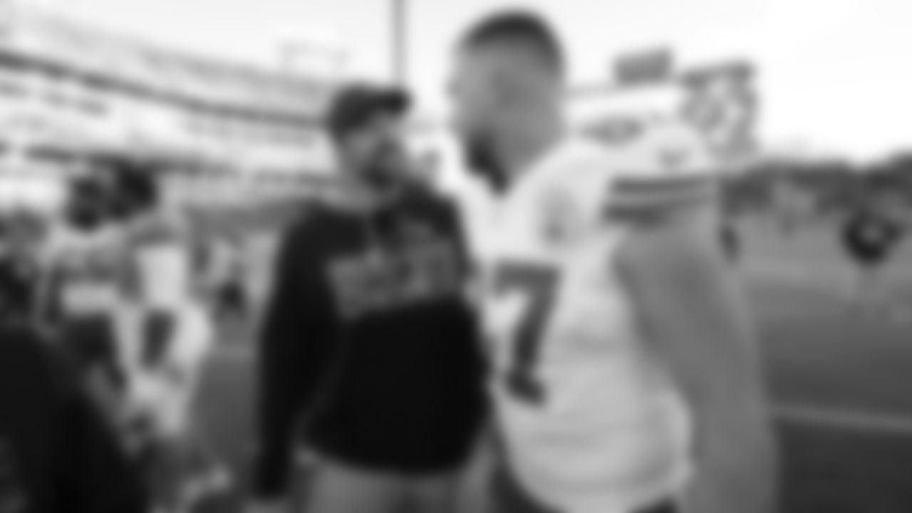 Titans tight ends coach Luke Stocker and Kansas City Chiefs tight end Travis Kelce (87) after a week 16 NFL Football game against the Tennessee Titans on Sunday, December 21, 2025 in Nashville, Tennessee.