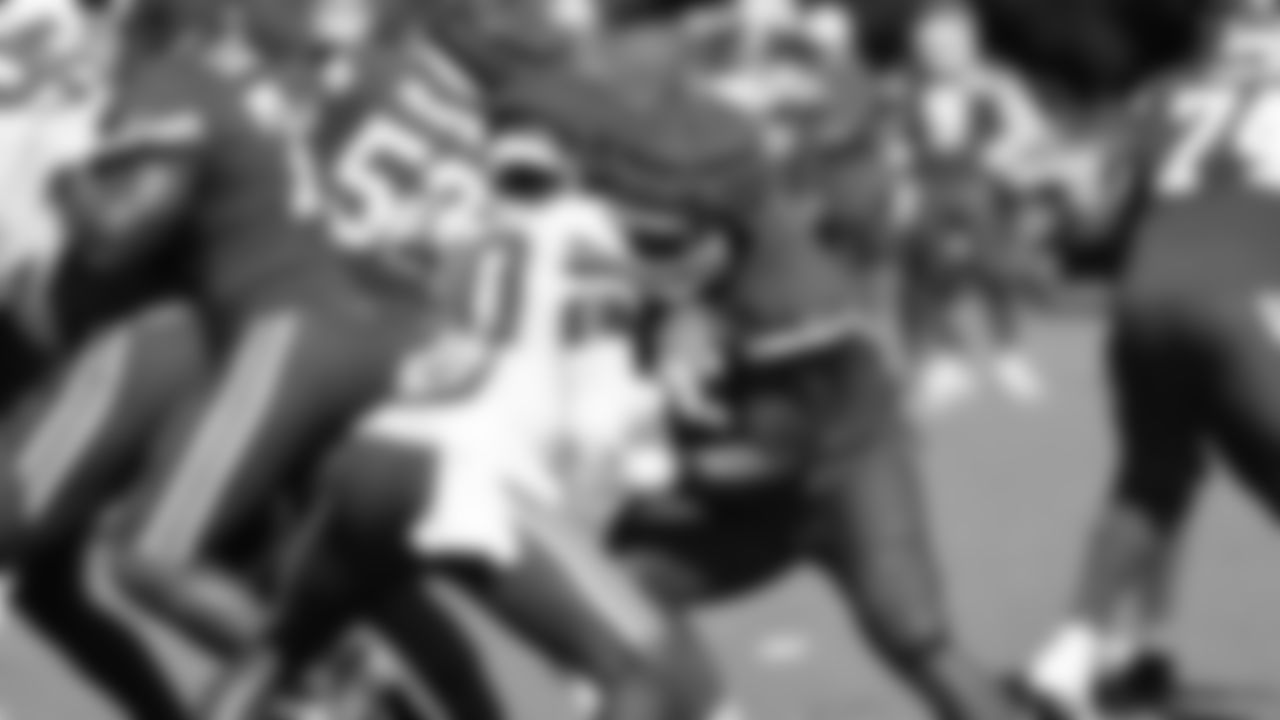Kansas City Chiefs offensive lineman Trey Smith (65) blocks defensive end Charles Omenihu (90)during day 5 of training camp on Sunday July 27, 2025