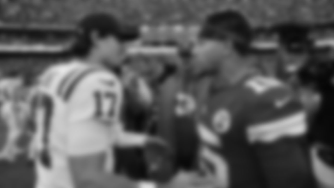 Kansas City Chiefs quarterback Patrick Mahomes (15) talks with Indianapolis Colts quarterback Daniel Jones (17) after a week 12 NFL Football game against the Indianapolis Colts on Sunday, November 23, 2025 in Kansas City, MO