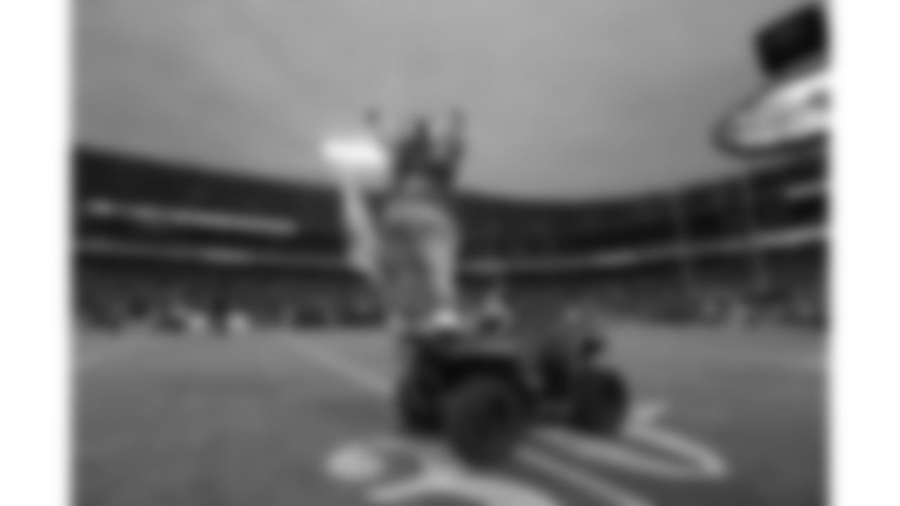 The Kansas City Chiefs mascot, KC Wolf, stands on an ATV to pump up the crowd prior to an NFL AFC Championship football game against the Cincinnati Bengals, Sunday, Jan. 29, 2023, in Kansas City, Missouri.