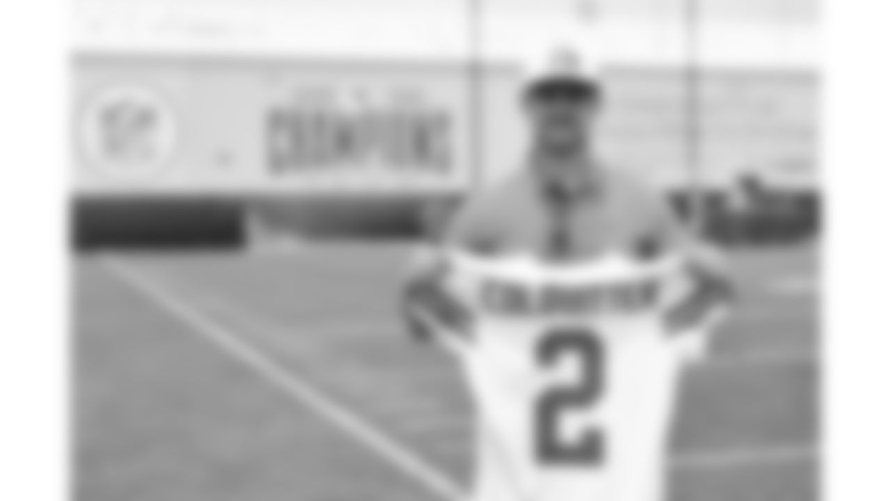 Former Kansas City Chiefs punter Dustin Colquitt holds up a jersey during phase 3 of OTAs on Wednesday, June 4, 2025 in Kansas City, MO.