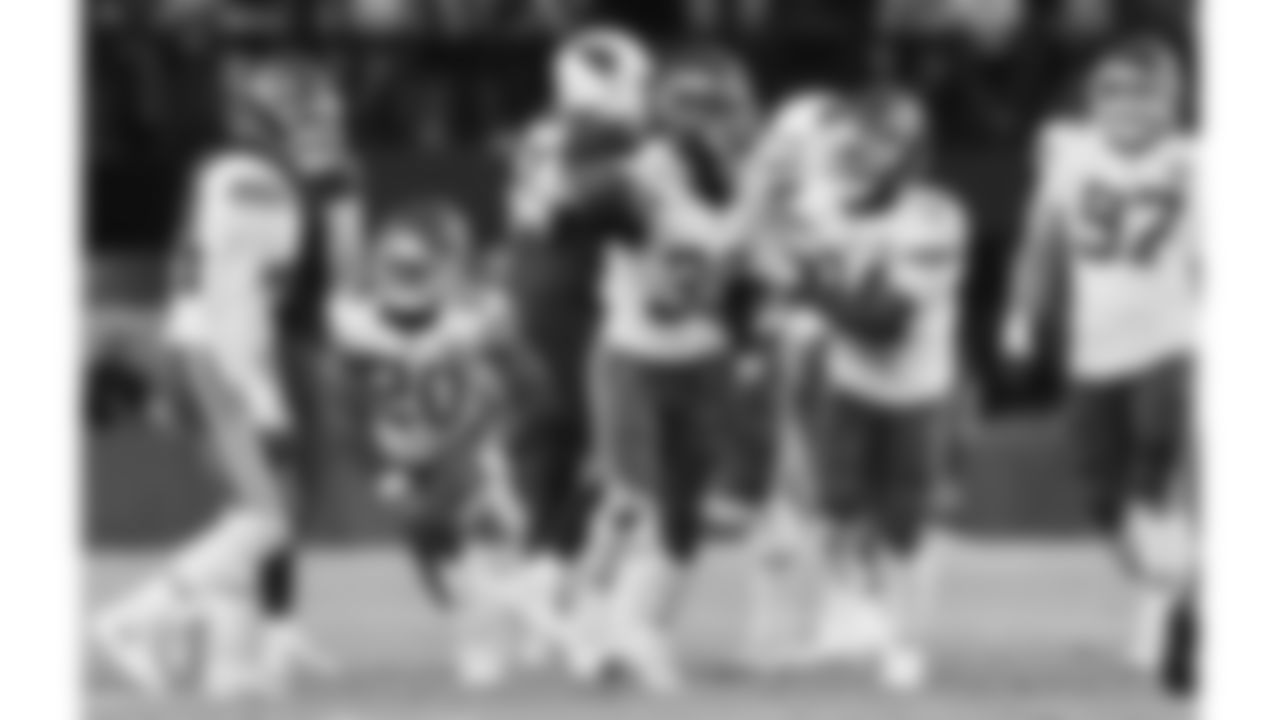 Kansas City Chiefs cornerback Chris Roland-Wallace (30) celebrates with linebacker Cam Jones (44), defensive back Nohl Williams (20), and safety Mike Edwards (34) during a preseason week 1 NFL football game against the Arizona Cardinals, Saturday, August 9, 2025 in Glendale, AZ.