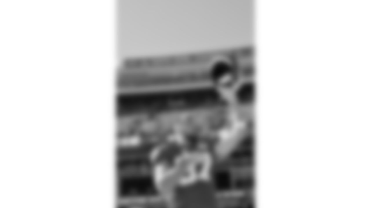 Kansas City Chiefs tight end Travis Kelce (87) raises his helmet over his head during the National Anthem prior to a week 7 NFL football game against the Las Vegas Raiders, Sunday, October 19, 2025 in Kansas City, MO.