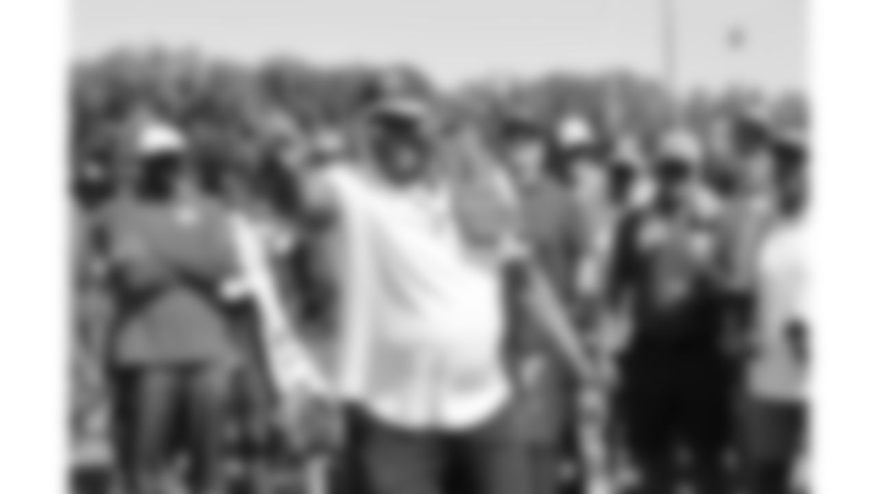 Former Chiefs player Neil Smith from the Kansas City Ambassadors and Legends group speaks to players after day 6 of training camp practice on Monday, July 28, 2025.
