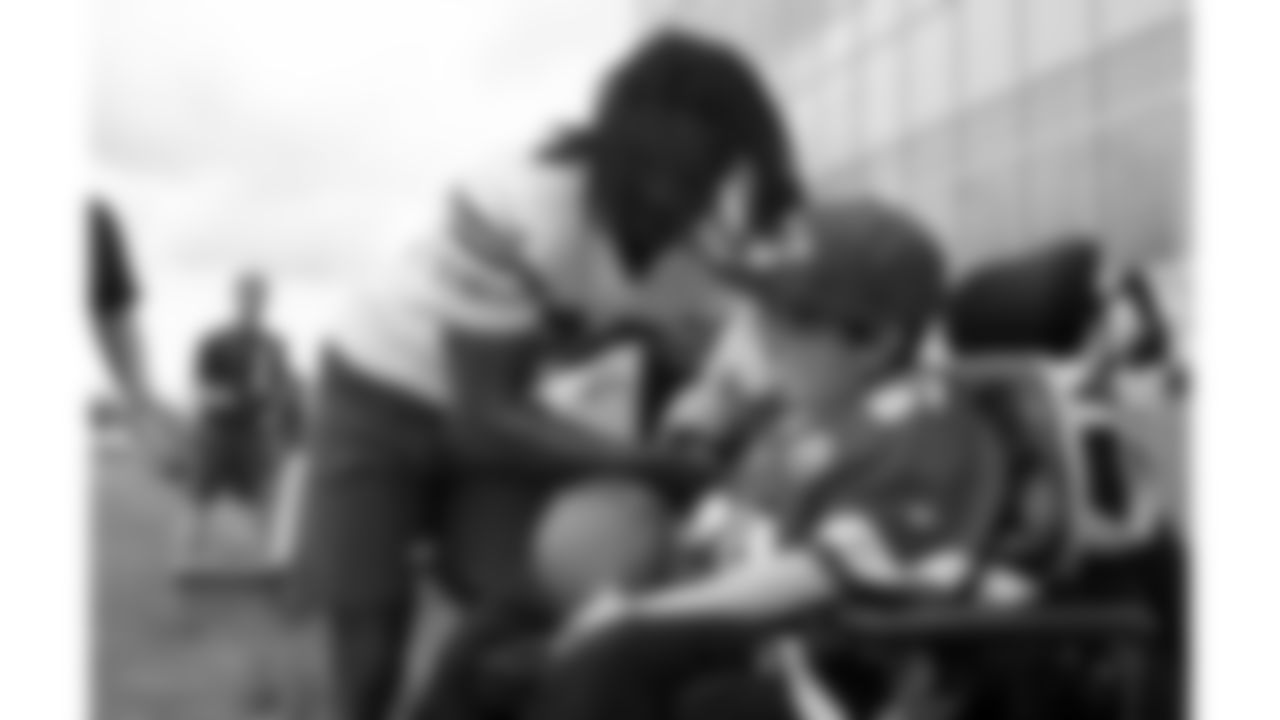 Josh "Turbo" Pham, a child battling an aggressive disease, visits practice during phase 3 of OTAs on Friday, June 13, 2025 in Kansas City, MO.