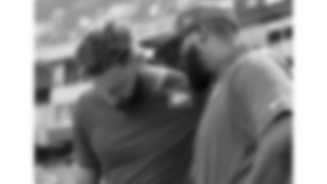 Kansas City Chiefs tight end Noah Gray (83) prays with Team Chaplain Marcellus Casey prior to the week 2 NFL football game against the Philadelphia Eagles, Sunday, September 14, 2025 in Kansas City, MO.