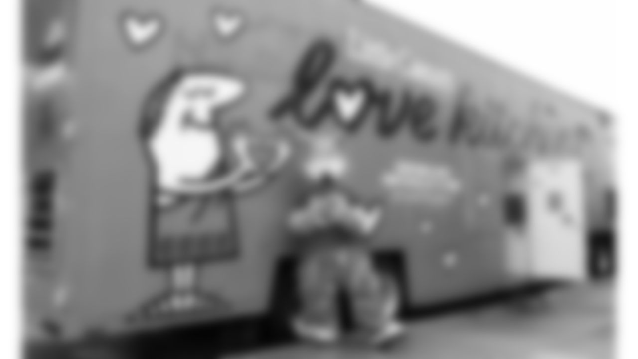 Kansas City Chiefs representatives and the Little Caesars Love Kitchen provide pizza for local U.S. service members and their families at Life.Church Faith & Family Chapel on Tuesday, September 23, 2025 in Kansas City, MO.