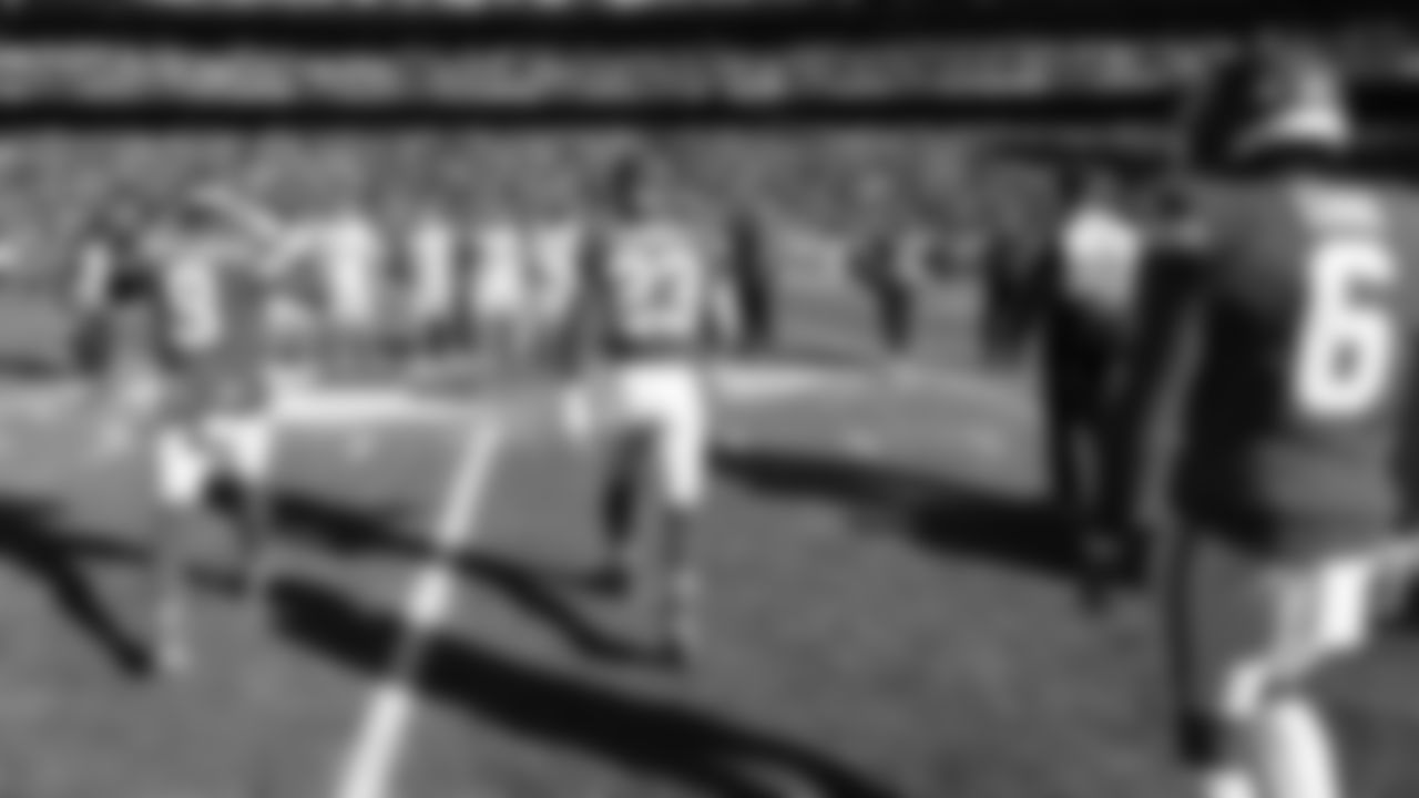 Team captains walk out for the Coin Toss prior to an NFL week 15 matchup against the Los Angeles Chargers, Sunday December 14, 2025.