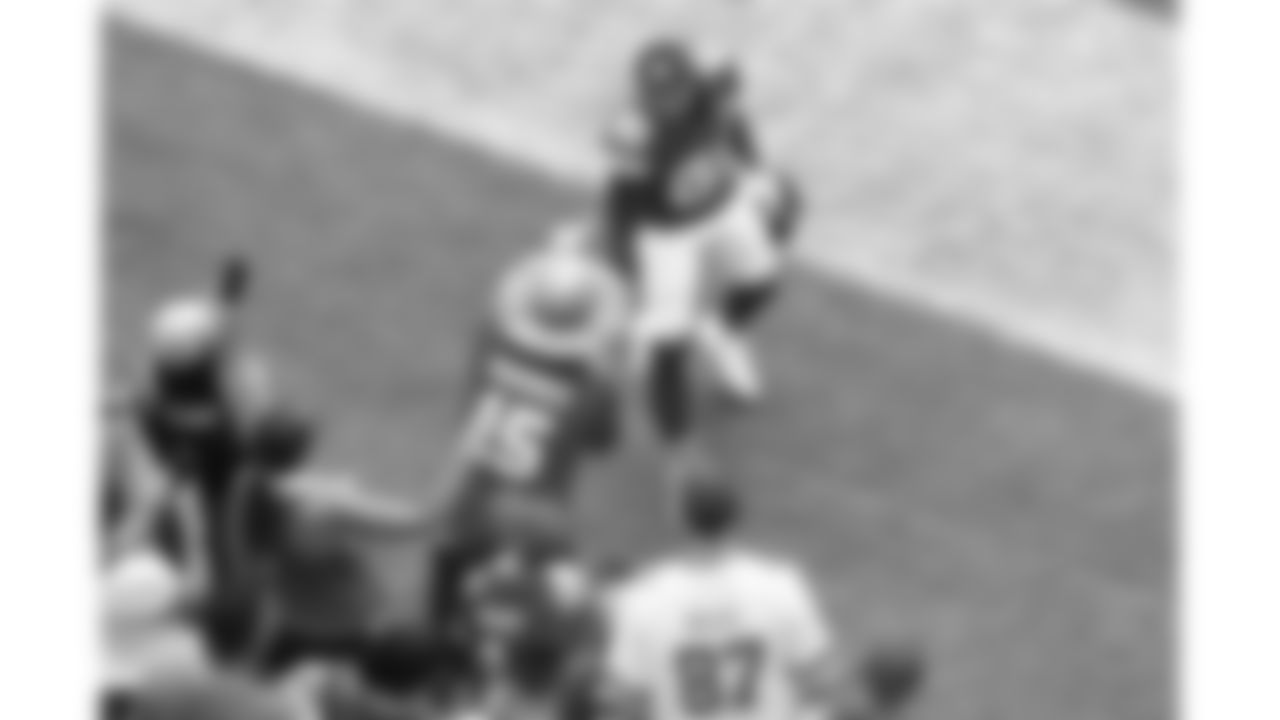 Kansas City Chiefs wide receiver Nikko Remigio (81) talks with a fan on the sideline prior to the week 2 NFL football game against the Philadelphia Eagles, Sunday, September 14, 2025 in Kansas City, MO.