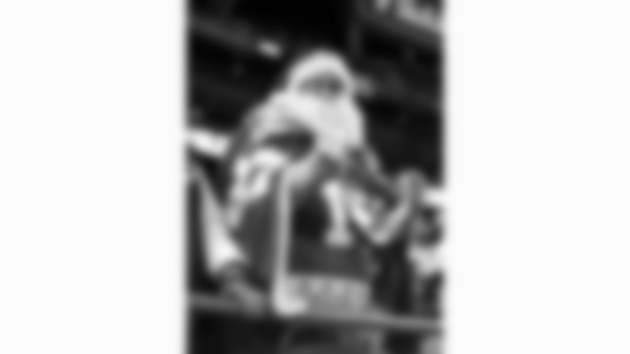 A Kansas City Chiefs fan dressed as Santa during a week 17 NFL football game against the Denver Broncos, Thursday, December 25, 2025 in Kansas City, MO.