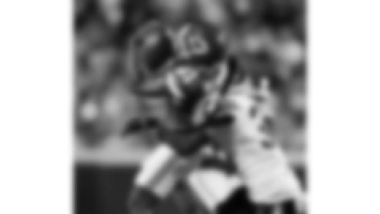 Kansas City Chiefs wide receiver Nikko Remigio (81) gets tackled by Chicago Bears safety Alex Cook (30) while catching the ball during a preseason week 3 NFL football game, Friday, August 22, 2025 in Kansas City, MO.