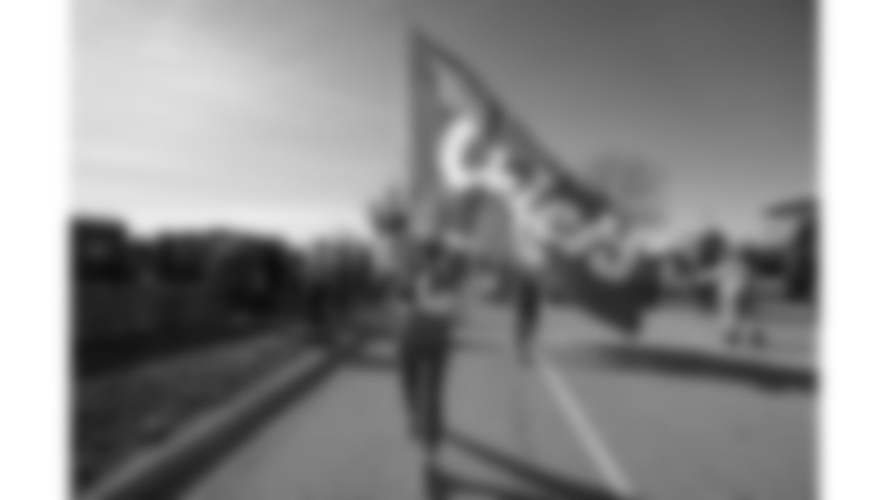 Chiefs Flag Runners prior to a week 15 NFL Football game against the Los Angeles Chargers on Sunday, December 14, 2025 in Kansas City, MO.