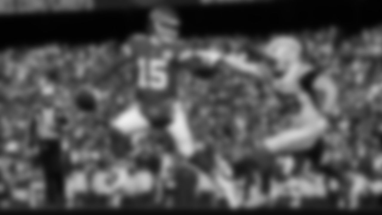 Kansas City Chiefs quarterback Patrick Mahomes (15) scrambles to avoid the sack during an NFL week 15 matchup against the Los Angeles Chargers, Sunday December 14, 2025.