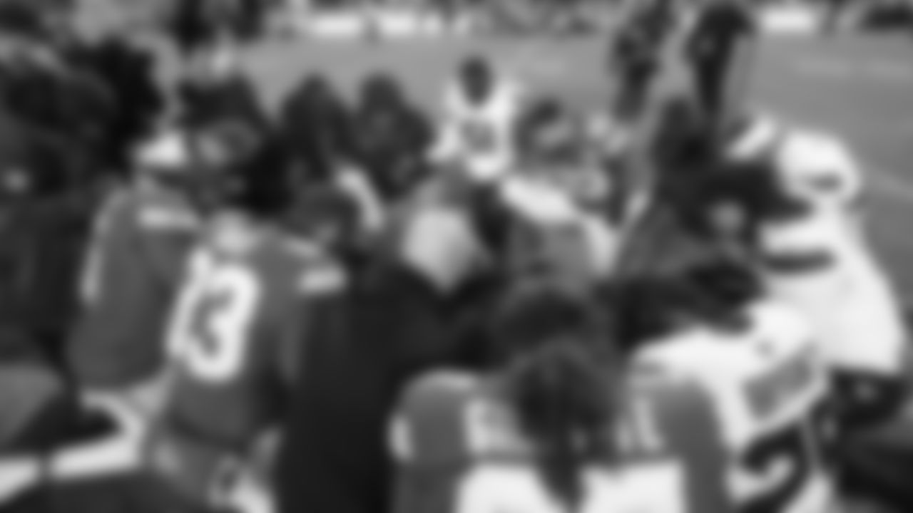 Both teams meet midfield to pray after an NFL week 14 matchup against the Houston Texans, Sunday December 7, 2025.