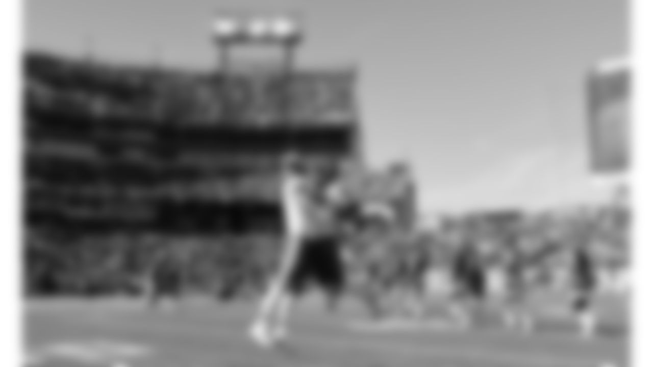 Kansas City Chiefs tight end Travis Kelce (87) and tight end Noah Gray (83) jump into each other prior to a week 16 NFL football game against the Tennessee Titans, Sunday, December 21, 2025 in Nashville, TN.