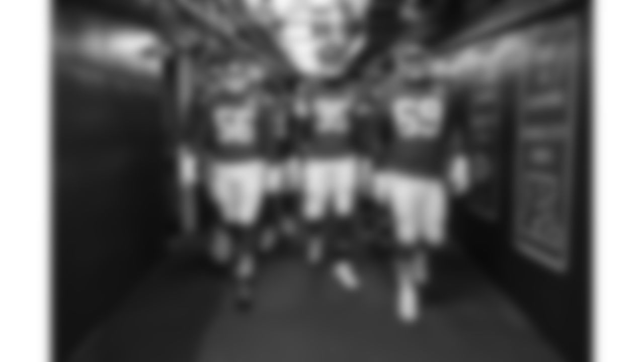 Kansas City Chiefs defensive end George Karlaftis (56), defensive tackle Chris Jones (95) and defensive tackle Mike Pennel (69) walk down the 50-yard tunnel prior to a week 12 NFL football game against the Indianapolis Colts, Sunday, November 23, 2025 in Kansas City, MO.
