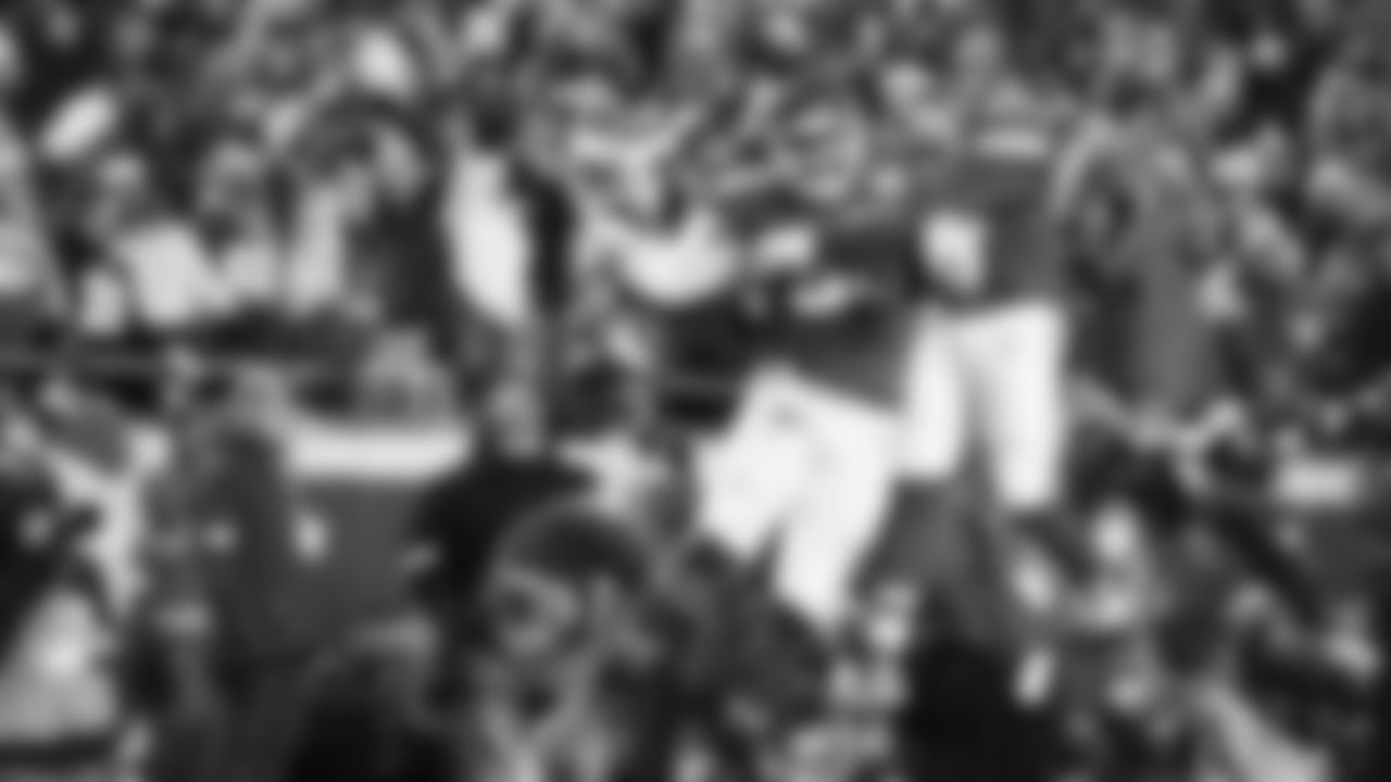 Defensive end George Karlaftis (56) celebrates with Kansas City Chiefs defensive tackle Chris Jones (95) celebrates with during an NFL week 14 matchup against the Houston Texans, Sunday December 7, 2025.