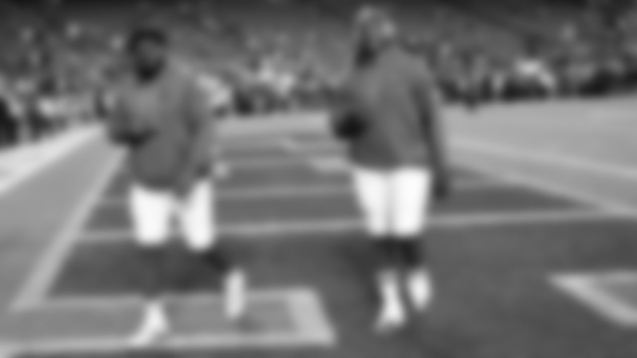 Offensive line Jaylon Moore (77) and Kansas City Chiefs offensive lineman Wanya Morris (64) on the field prior to a week 8 NFL Football game against the Washington Commanders on Monday, October 27, 2025 in Kansas City, MO.