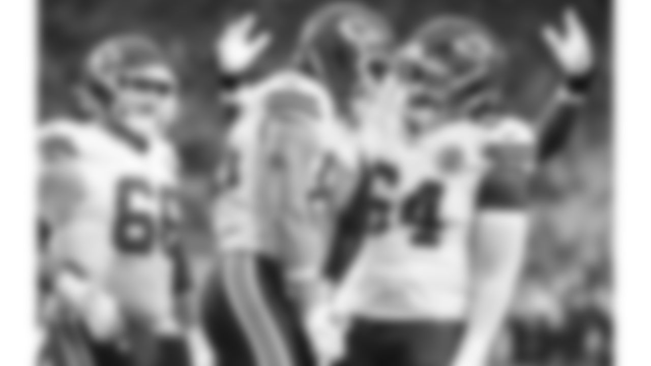 Kansas City Chiefs tight end Robert Tonyan (85) celebrates with offensive tackle Wanya Morris (64) after scoring a touchdown during a preseason week 2 NFL football game against the Seattle Seahawks, Friday, August 15, 2025 in Seattle, WA.