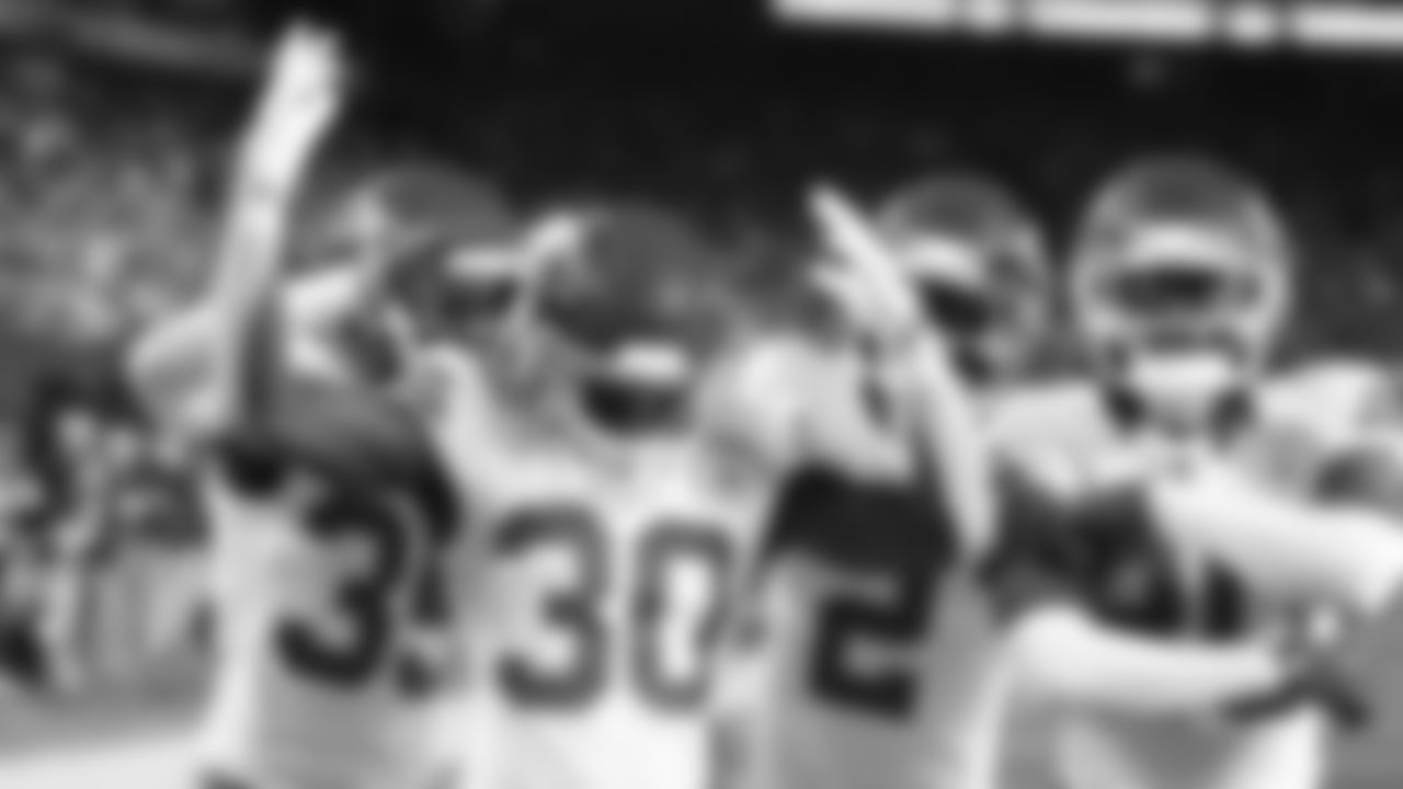 Kansas City Chiefs cornerback Jaylen Watson (35), cornerback Chris Roland-Wallace (30), cornerback Joshua Williams (2) and defensive back Nohl Williams (20) celebrate in the end zone after getting an interception during the week 3 NFL football game against the New York Giants, Sunday, September 21, 2025 in East Rutherford, NJ.