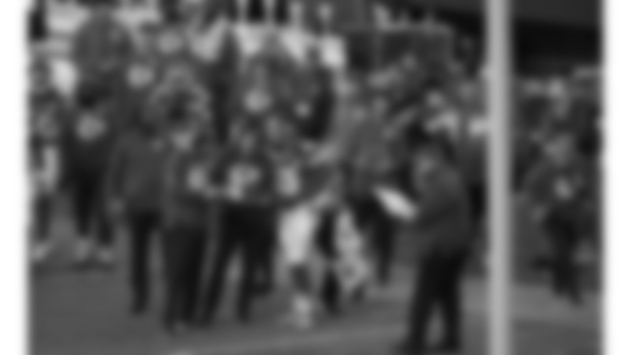 Kansas City Chiefs quarterbacks coach David Girardi, Offensive Coordinator Matt Nagy and quarterback Patrick Mahomes (15) talk on the sideline during a week 12 NFL football game against the Indianapolis Colts, Sunday, November 23, 2025 in Kansas City, MO.