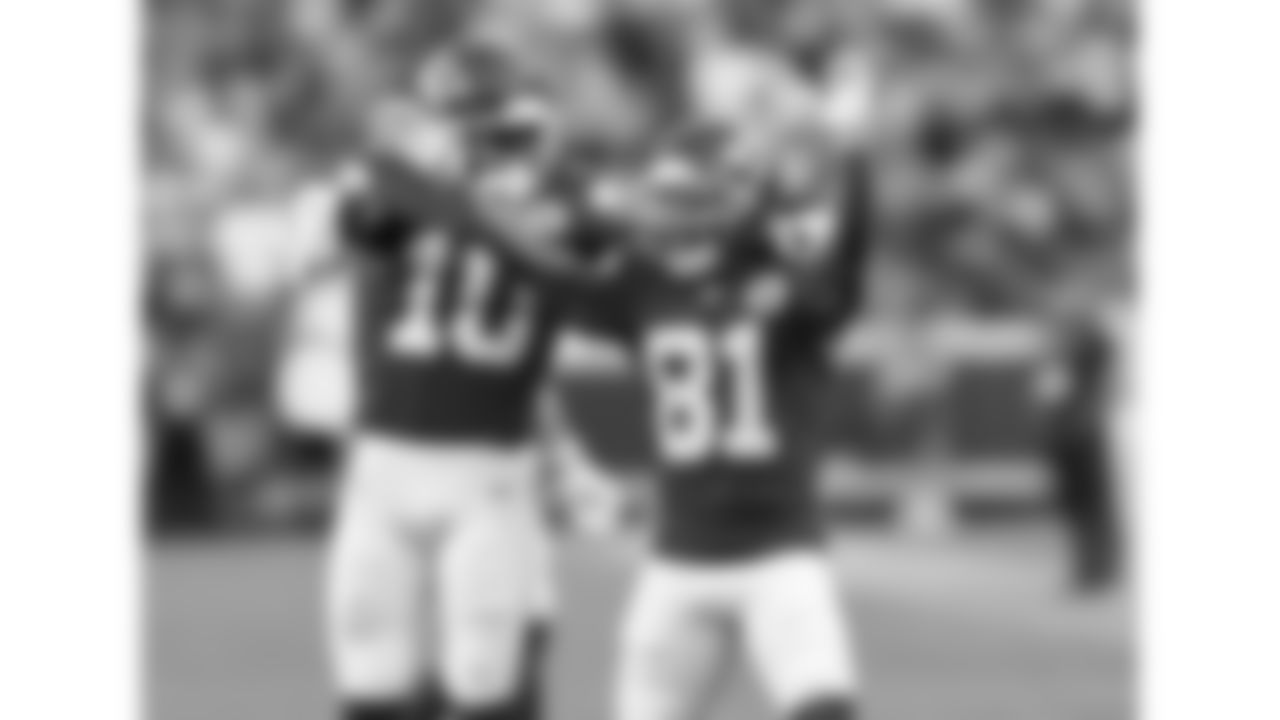 Kansas City Chiefs running back Isiah Pacheco (10) and wide receiver Nikko Remigio (81) celebrate down the field during the week 4 NFL football game against the Baltimore Ravens, Sunday, September 28, 2025 in Kansas City, MO.