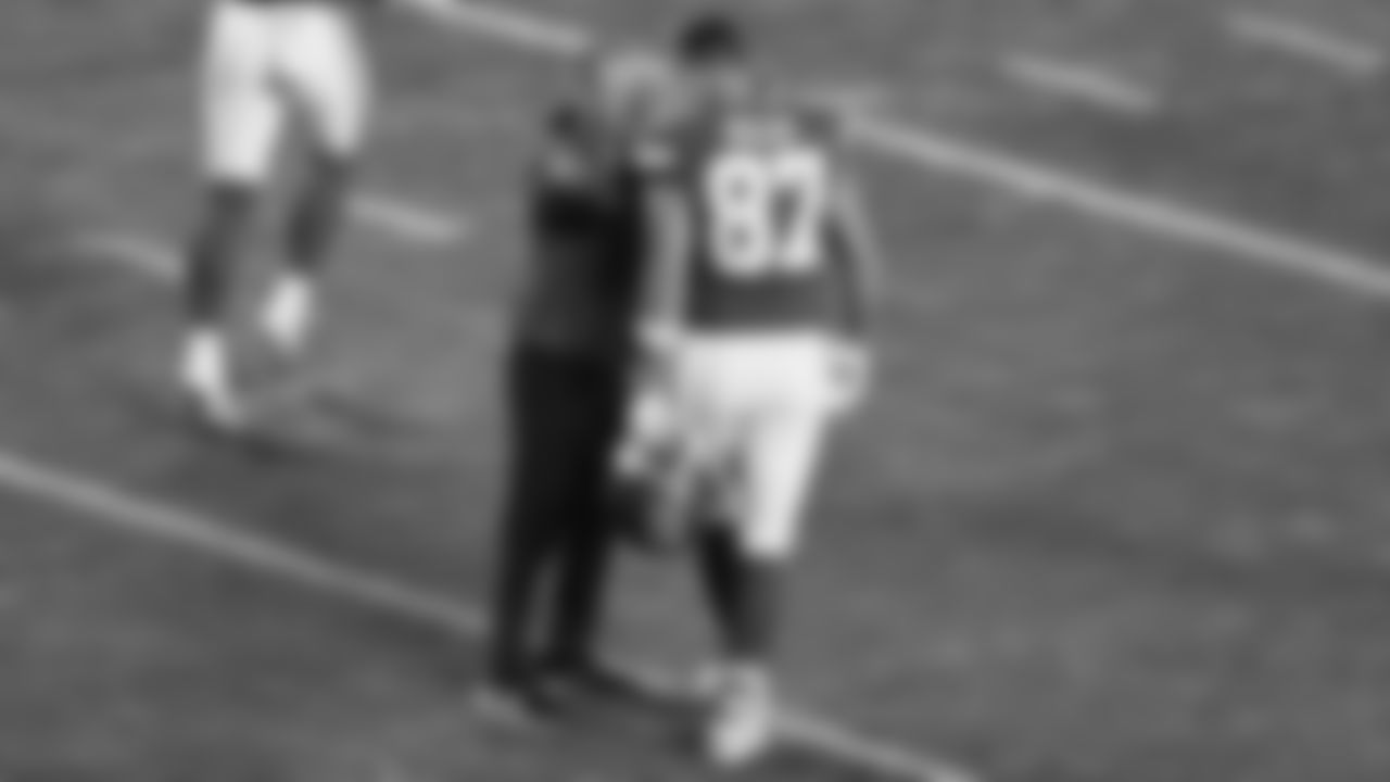 Defensive Coordinator Steve Spagnuolo talks with Kansas City Chiefs tight end Travis Kelce (87) prior to an NFL week 17 matchup against the Denver Broncos, Thursday, December 25, 2025.