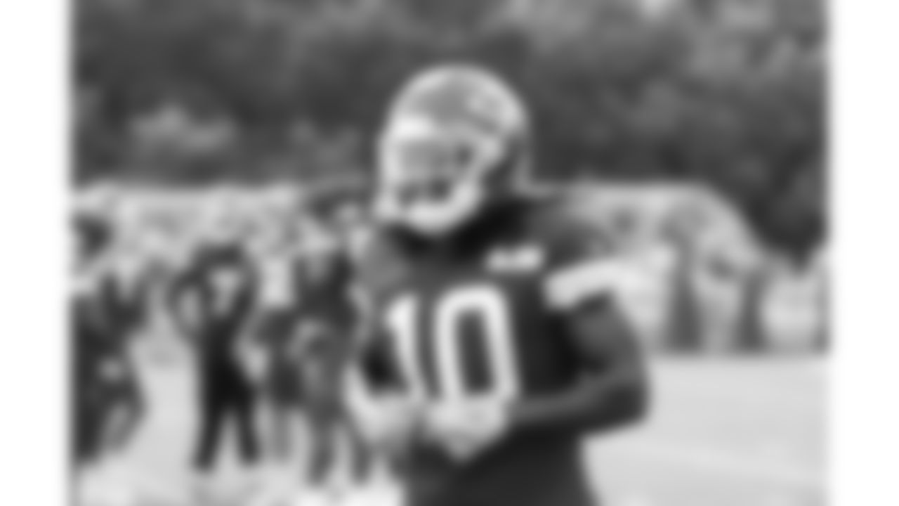 Kansas City Chiefs running back Isiah Pacheco (10) smiles during day 11 of training camp practice on Sunday, August 3, 2025.