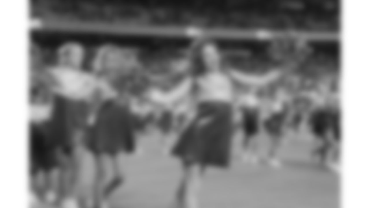 Junior Chiefs Cheerleaders perform a halftime routine with Kansas City Chiefs Cheerleaders during a week 3 preseason NFL game against the Chicago Bears, August 22, 2025 in Kansas City, MO.