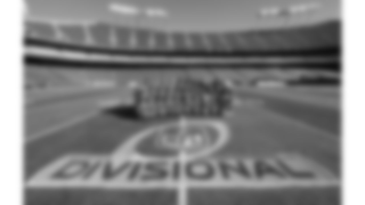 Kansas City Chiefs Cheerleaders pose with the Divisional logo prior to the NFL Divisional Round playoff game against the Houston Texans on Saturday, January 18, 2025 in Kansas City, MO.