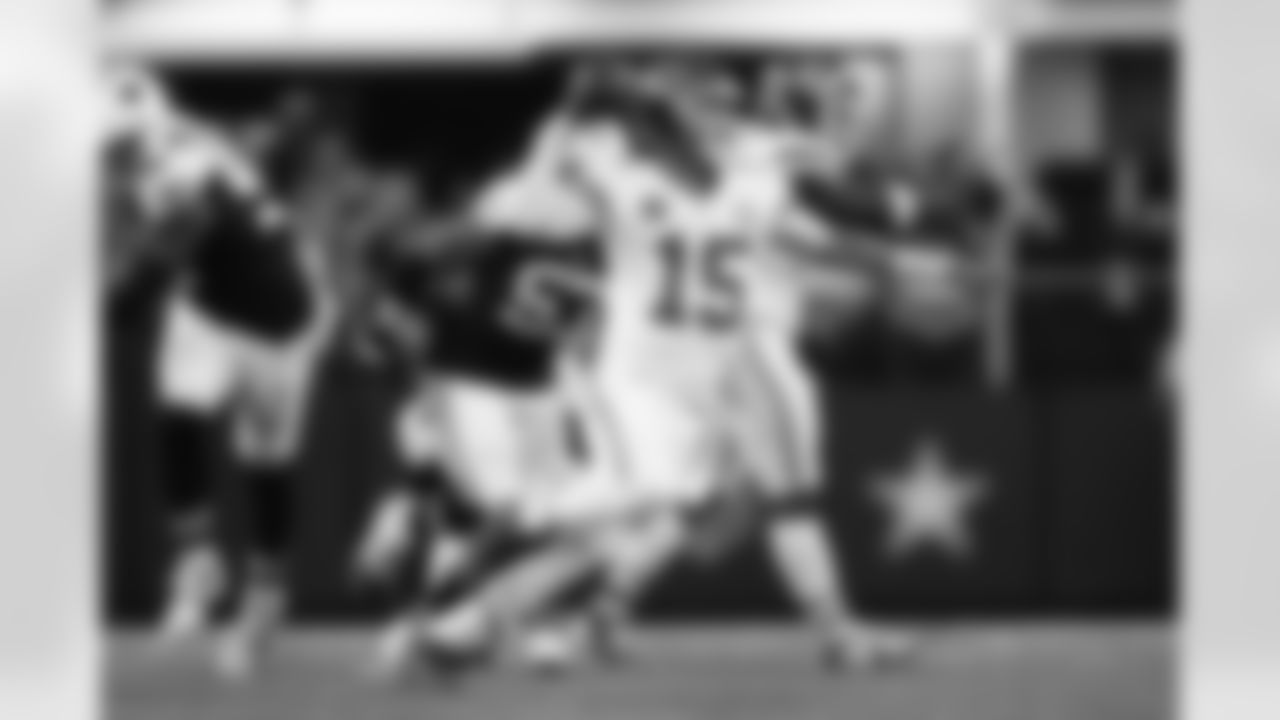 Kansas City Chiefs quarterback Patrick Mahomes (15) looks to pass during a week 13 NFL football game against the Dallas Cowboys on Thursday, November 27, 2025 in Arlington, TX.