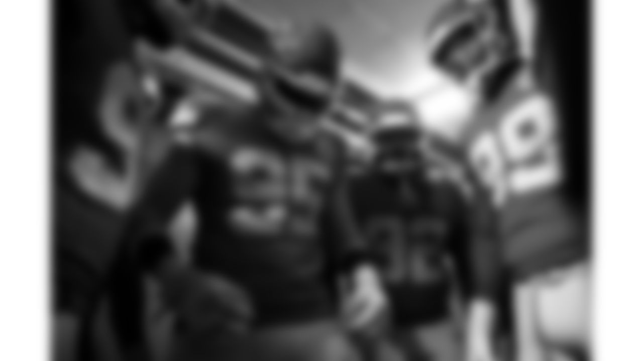 Kansas City Chiefs defensive tackle Chris Jones (95), defensive tackle Derrick Nnadi (92) and defensive lineman Jerry Tillery (99) huddle in the 50-yard tunnel prior to a week 14 NFL football game against the Houston Texans, Sunday, December 7, 2025 in Kansas City, MO.