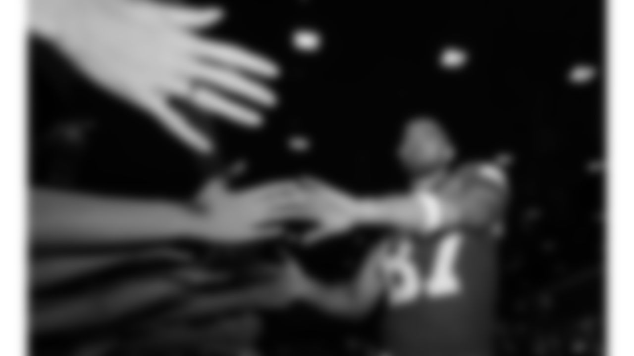 Kansas City Chiefs tight end Travis Kelce (87) high fives fans in the Bud Light Locker Room Club following the week 6 NFL football game against the Detroit Lions, Sunday, October 12, 2025 in Kansas City, MO.