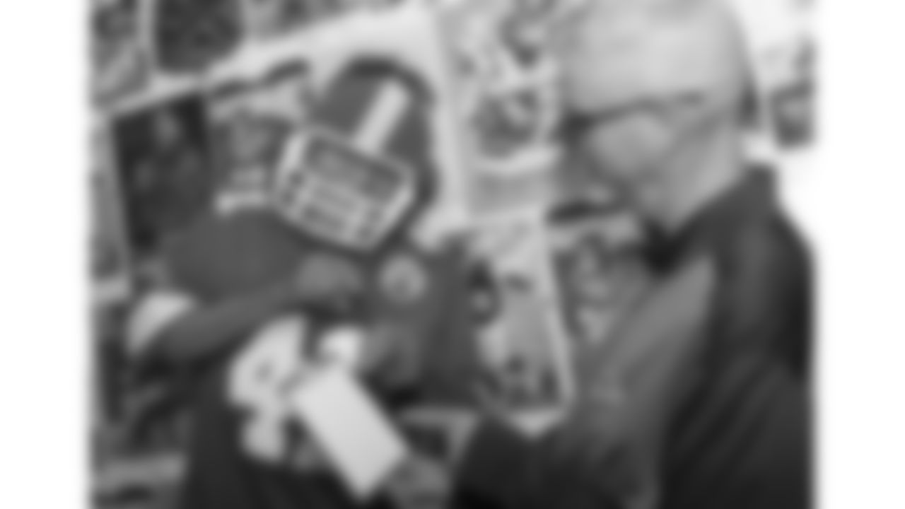 Red Coaters gather at the Kingdom Club to watch the Chiefs take on the Denver Broncos on November 16, 2025.