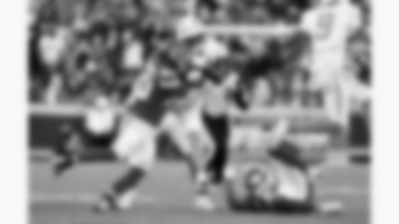 Kansas City Chiefs middle linebacker Drue Tranquill (23) hits Los Angeles Chargers running back Kimani Vidal (30) during a week 15 NFL football game, Sunday, December 14, 2025 in Kansas City, MO.