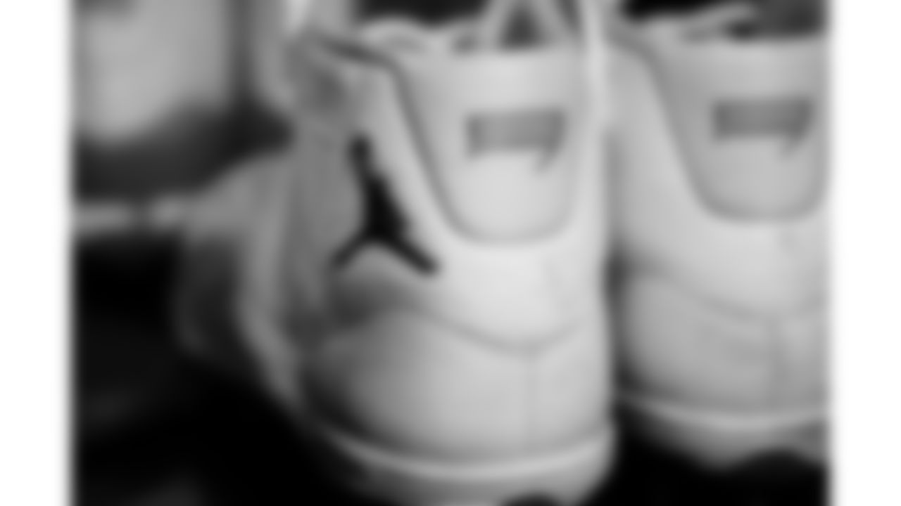 A detail of Kansas City Chiefs tight end Travis Kelce's (87) cleats in his locker prior to a week 18 NFL football game against the Las Vegas Raiders, Sunday, January 4, 2026 in Las Vegas, NV.