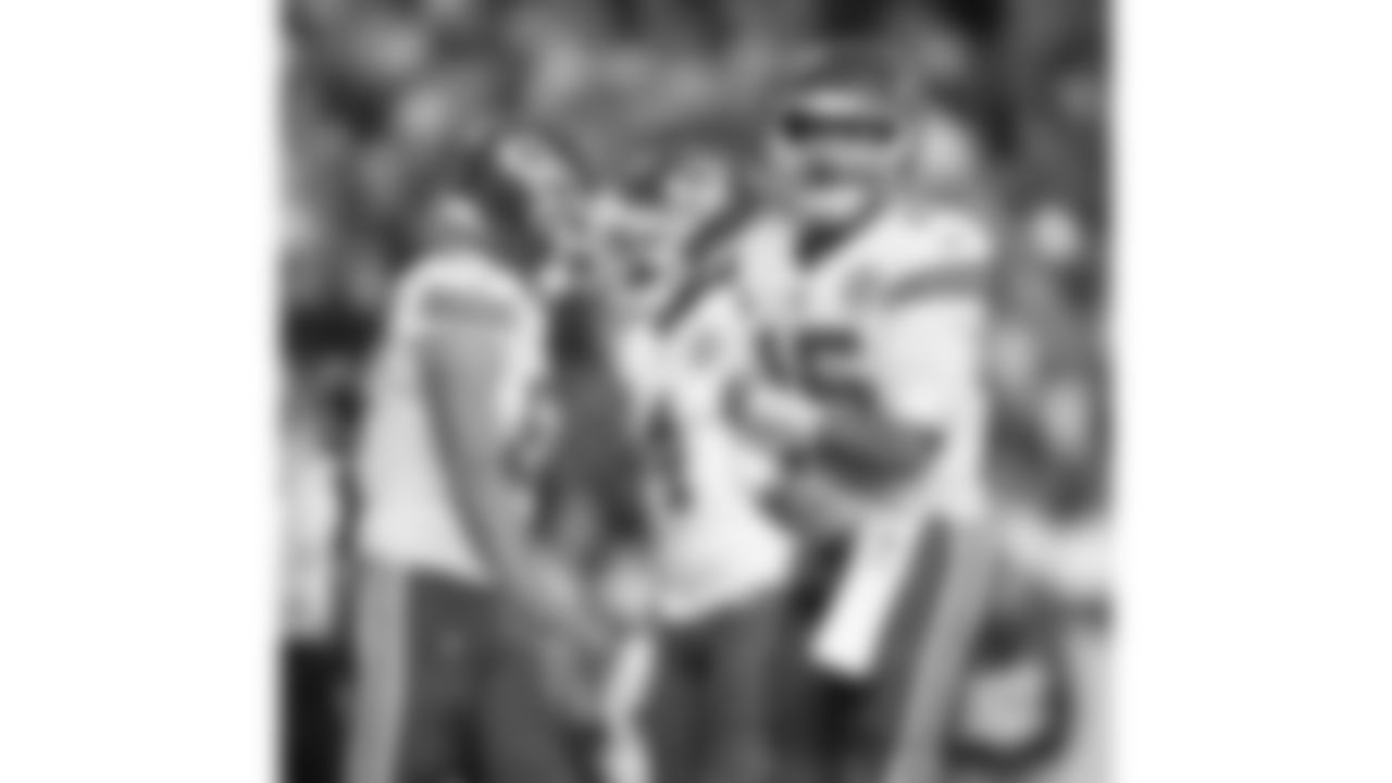 Kansas City Chiefs quarterback Patrick Mahomes (15) celebrates tight end Travis Kelce (87) breaking the record for most touchdowns in franchise history during a week 11 NFL football game against the Denver Broncos, Sunday, November 16, 2025 in Denver, CO.